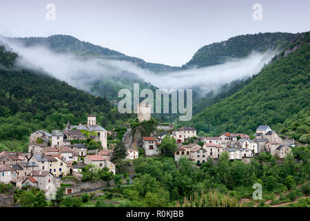 Village of  Peyreleau in the mist above the Gorges du Tarn Aveyron France Stock Photo