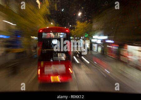 A blurred bus journey along the Walworth Road, on 6th November 2018, in London, England. Stock Photo