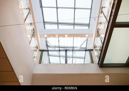 An interior of decorated shopping center at Christmas time. Stock Photo