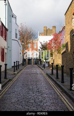 Back Lane, a pretty, narrow, cobbled street of houses in Hampstead, London, England, UK Stock Photo