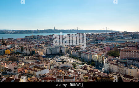 View over the city from Miradouro da Nossa Senhora do Monte, with Ponte 25 de Abril, Lisbon, Portugal Stock Photo