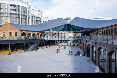 Coal Drops Yard a unique new shopping quarter at King's Cross, London, UK created by Heatherwick Studio by converting two Victorian industrial buildin Stock Photo