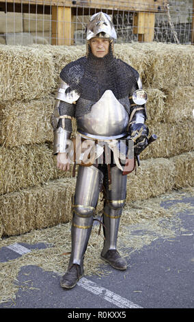 medieval knight, detail of a man dressed in medieval armor, war and destruction Stock Photo