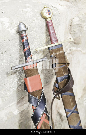 Ancient medieval swords, edged weapons detail to kill, a tool of war and destruction, death Stock Photo