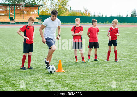 Boy Football Team Training Stock Photo