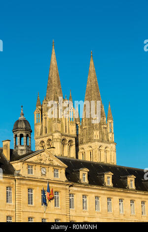 The town hall's facade in front of the The Abbey of Saint-Étienne, also known as Abbaye aux Hommes founded in 1063 Stock Photo