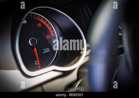 Car RPM gauge, modern car interior and instrument cluster Stock Photo