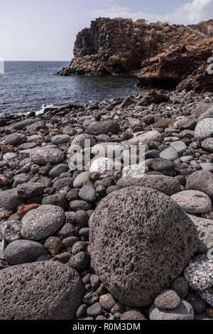 Volcanic pumice rocks on the Atlantic shore of Tenerife at Amarilla in the Canary Islands Stock Photo