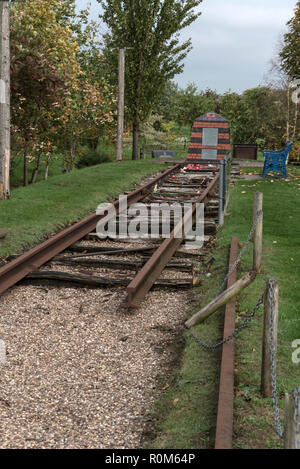 A short rail track as part of a World War 11 memorial to allied prisoners of war, who died whilst working in harsh conditions on the Sumatra railway u Stock Photo