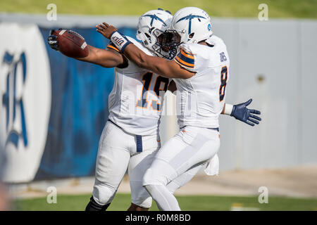 Houston, TX, USA. 3rd Nov, 2018. UTEP Miners running back Treyvon Hughes (19) celebrates his touchdown with UTEP Miners quarterback Brandon Jones (8) during the 3rd quarter of an NCAA football game between the UTEP Miners and the Rice Owls at Rice Stadium in Houston, TX. UTEP won the game 34 to 26.Trask Smith/CSM/Alamy Live News Stock Photo