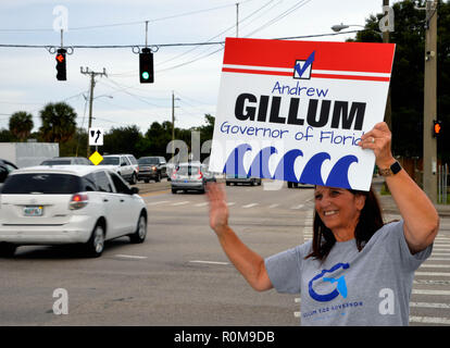 Melbourne, Florida, USA.  November 5, 2018 Candidates wave their political signs until sunset to get their massage out to the public who have not voted yet. Last day to vote in person is November 6 polls open at 0700 until 1900 hours. Photo Credit Julian Leek / Alamy Live News Stock Photo