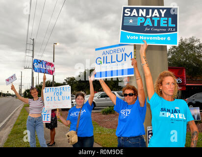 Melbourne, Florida, USA.  November 5, 2018 Candidates wave their political signs until sunset to get their massage out to the public who have not voted yet. Last day to vote in person is November 6 polls open at 0700 until 1900 hours. Photo Credit Julian Leek / Alamy Live News Stock Photo