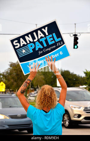 Melbourne, Florida, USA.  November 5, 2018 Candidates wave their political signs until sunset to get their massage out to the public who have not voted yet. Last day to vote in person is November 6 polls open at 0700 until 1900 hours. Photo Credit Julian Leek / Alamy Live News Stock Photo