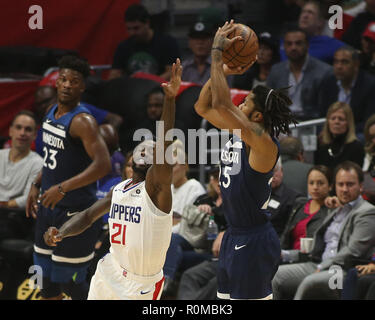 Los Angeles, CA, USA. 5th Nov, 2018. Minnesota Timberwolves guard Derrick Rose #25 elevating to shoot a three overLA Clippers guard Patrick Beverley #21 during the Houston Rockets vs Los Angeles Clippers at Staples Center on November 5, 2018. (Photo by Jevone Moore) Credit: csm/Alamy Live News Stock Photo