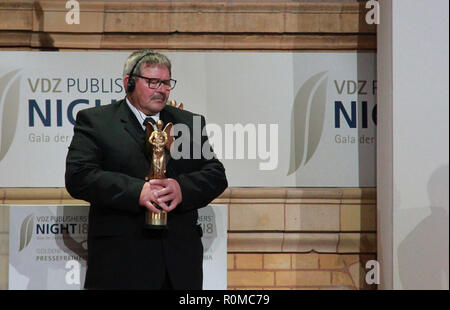 Jozef Kuciak, father of murdered Slovak journalist Jan Kuciak, received the Golden Victoria German media award in the press freedom category  for his son Jan in memoriam in Berlin, German, on November 5, 2018. Kuciak, 27, who was shot dead together with his fiancee of the same age, in their Slovak home in February, tried to uncover links between Slovak politicians and mafia. The last article he worked on before his death dealt with the fraudulent activities of Italian businesspeople in east Slovakia, mainly subsidy and VAT frauds. The German Magazine Publishers' Association (VDZ) bestowed the  Stock Photo