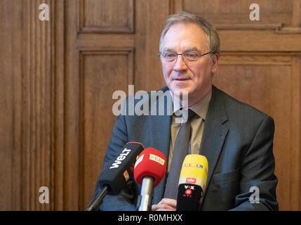 Berlin, Germany. 06th Nov, 2018. Jörg Raupach, head of the public prosecutor's office, speaks at a press conference about a raid by the federal police against suspected smugglers. Berlin investigators have succeeded in striking a considerable blow against the smuggling of illegal immigrants. Four main suspects were arrested during the largest deployment of the Federal Police in the capital to date against illegally smuggled foreigners. Credit: Paul Zinken/dpa/Alamy Live News Stock Photo