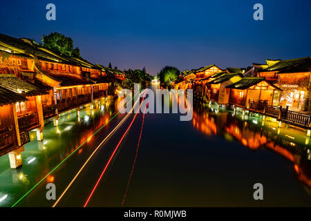 Tongxiang. 6th Nov, 2018. Photo taken on Nov. 6, 2018 shows the night scenery of Wuzhen, east China's Zhejiang Province. The fifth World Internet Conference (WIC) is scheduled to run from November 7-9 in the river town of Wuzhen. Credit: Cai Yang/Xinhua/Alamy Live News Stock Photo