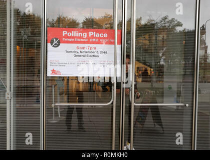 Chicago, USA. 06th Nov, 2018.  A voter walks out of a polling station in Chicago, the United States, on Nov. 6, 2018. U.S. voters began to cast their ballots in the midterm elections as the first polling stations opened Tuesday morning. Credit: Wang Ping/Xinhua/Alamy Live News Stock Photo