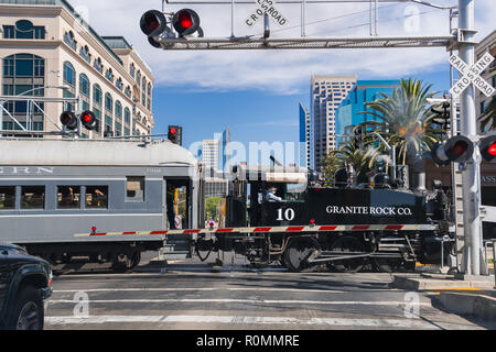 September 22, 2018 Sacramento / CA / USA - The  Granite Rock steam engine locomotive pulling cars full of tourists in downtown Sacramento; Stock Photo