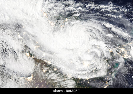 Hurricane over planet Earth - satellite photo. Elements of this image furnished by NASA. Stock Photo