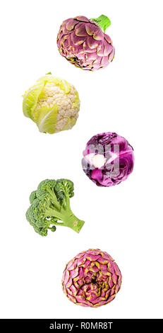 Fresh flying vegetables ingredients isolated on a white background. Stock Photo