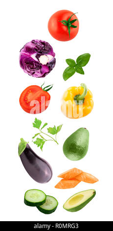 Fresh flying vegetables ingredients isolated on a white background. Stock Photo