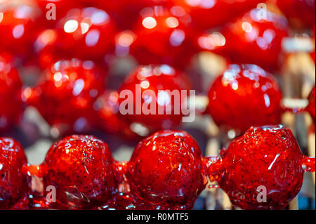 Tanghulu traditional Chinese hard caramel coated fruit skewers close-up also called bing tanghulu candied hawthorn sticks Stock Photo