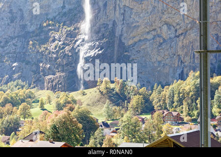 View of Staubbachfall waterfall from train heading for Kleine Scheidegg, Jungfrau Region, Switzerland Stock Photo