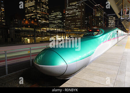 TOKYO, JAPAN -22 OCT 2018- A green Series E5 Shinkansen high-speed bullet train operated by JR East at the Tokyo station. Stock Photo