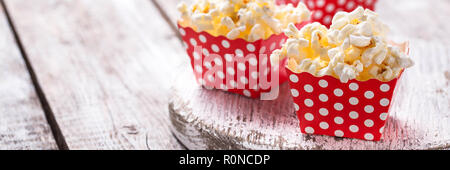 Popcorn in red polka dot pack  Stock Photo