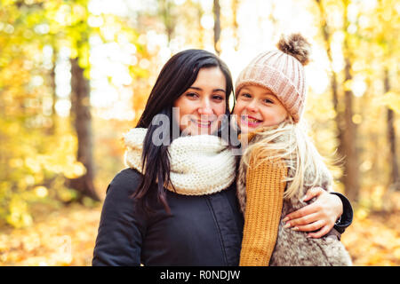 A Happy family on autumn, Mother and daughter in the Park Stock Photo