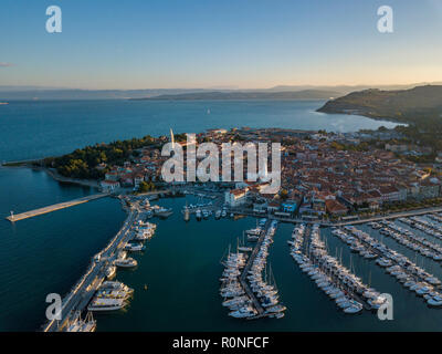 Aerial view of old town Izola in Slovenia, beautiful cityscape at sunset. Adriatic sea coast, peninsula of Istria, Europe. Stock Photo