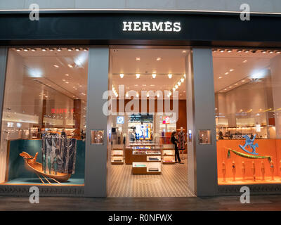 ISTANBUL, TURKEY - SEPTEMBER 27, 2018: Front facade of Hermes store with people inside at Istanbul Airport Stock Photo