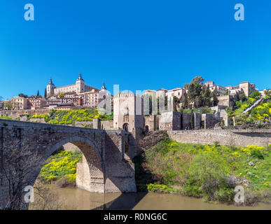 Toledo, Spain. The historic old town, Alcazar, River Tagus and Puente de Alcantara, Toledo, Castilla-La Mancha, Spain Stock Photo