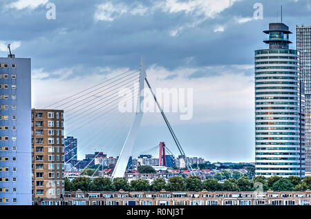 Rotterdam, The Netherlands, october 12, 2018: Erasmus and Willems bridges in conjunction flanked by the Katendrecht and Wilhelminapier highrise Stock Photo