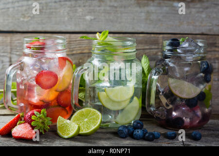 Mojito Cocktail in Glass Jars on Blue Water Background. Copy Space. Stock  Photo by annapustynnikova