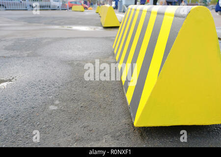 traffic limiters in the Parking lot. Modern barrier fence for cars in ...