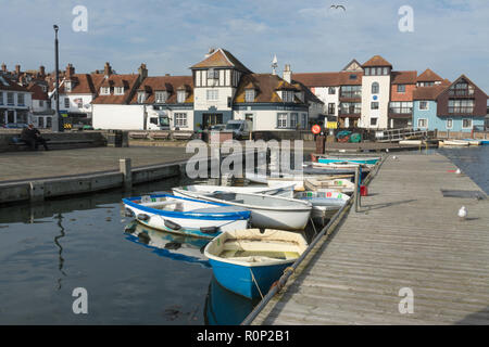 Lymington Harbour, Lymington, Hampshire, UK, with boats and buildings Stock Photo