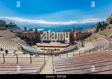 Taormina, Italy - September 26, 2018: Ruins of the ancient greek theater of Taormina, Sicily, Italy. Stock Photo