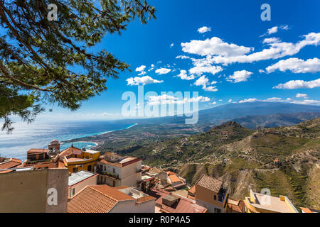 The view from the small village Castelmola at mountain top above Taormina, with the view of Mediterranean Sea and the skyline of Taormina. Stock Photo