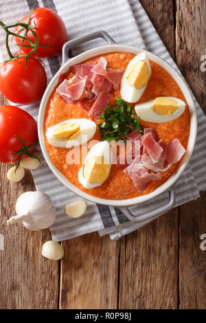 Porra antequera is a traditional Spanish tomato could soup close-up on the table. Vertical top view from above Stock Photo