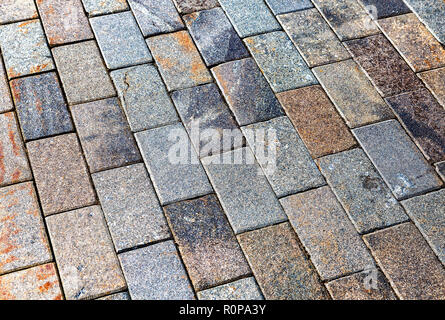 Grey paving stones as background texture closeup Stock Photo