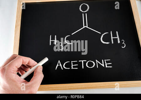 Written to hand with chalk in a slate it formulates of the acetone Stock Photo