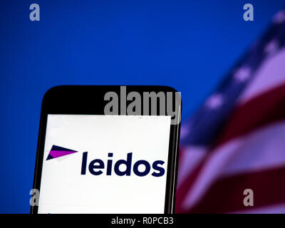 Leidos Scientific research company logo seen displayed on smart phone. Leidos, formerly known as Science Applications International Corporation, is an American defense, aviation, information technology, and biomedical research company, that provides scientific, engineering, systems integration, and technical services Stock Photo