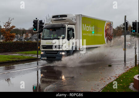 Clonakilty, West Cork, Ireland. 6th Nov, 2018. A lorry drives through a pool of water after a morning of torrential rain in Clonakilty. Rain is forecast for the rest of the week with Friday being very wet and windy. Credit: AG News/Alamy Live News. Stock Photo