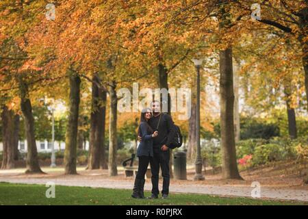 Brussels, Belgium. 6th Nov, 2018. People take selfies in Brussels Park in Brussels, Belgium, Nov. 6, 2018. People went outdoors to enjoy autumn scenery in Brussels recently. Credit: Zheng Huansong/Xinhua/Alamy Live News Stock Photo