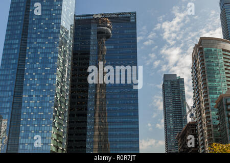 Toronto, CANADA - October 10, 2018:View of the streets of Toronto with The CN Tower, a 553.3 m-high concrete communications and observation tower Stock Photo