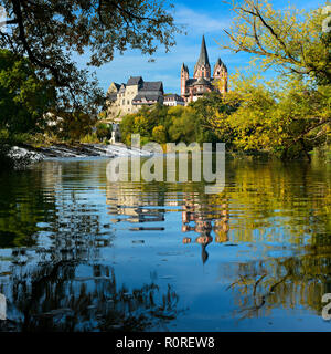 Limburg Cathedral St. Georg or Georgsdom and imburg castle over the river Lahn in autumn, water mirroring, Limburg an der Lahn Stock Photo