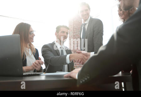 shaking hands after a business meeting in the office Stock Photo