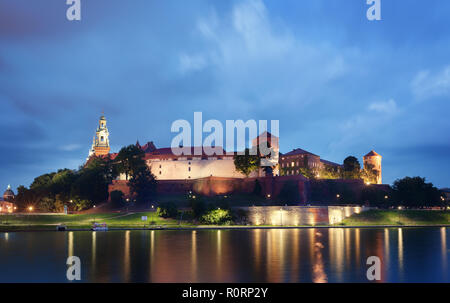 Wawel Castle at night with the river Vistula at the foreground. Stock Photo
